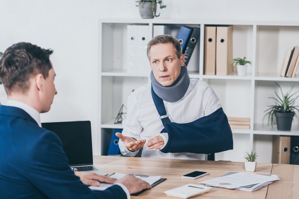 An injured man talking to a Certified Life Care Planner