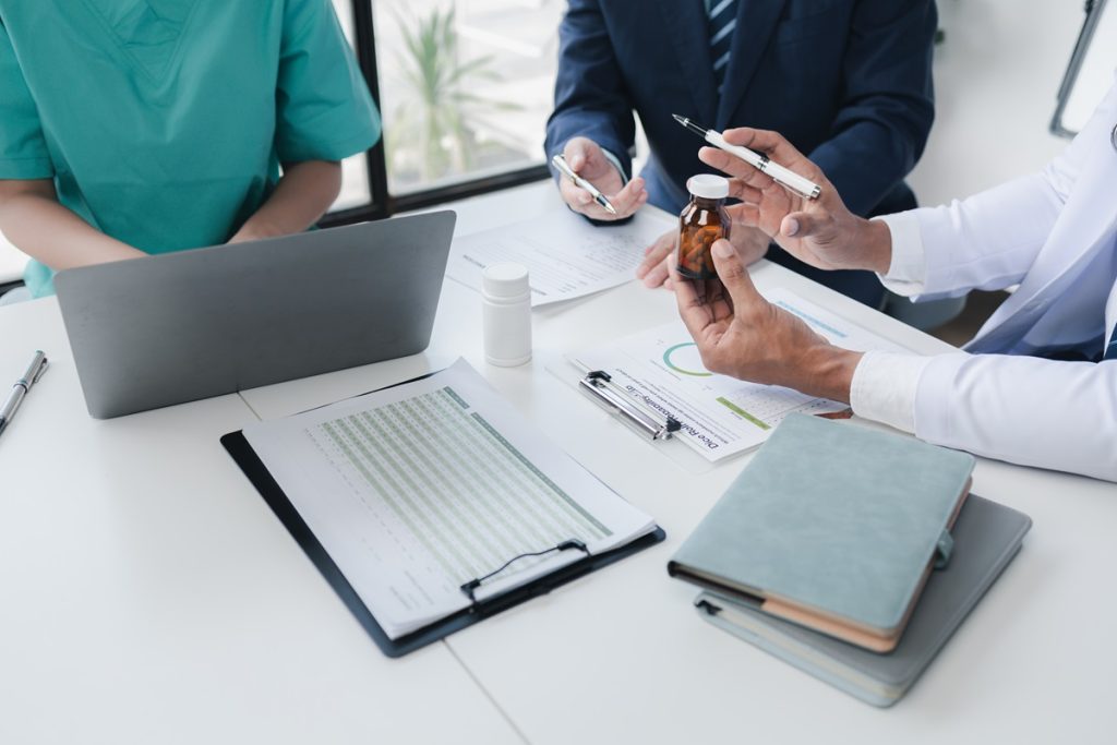 A group of cost consultants discussing a case