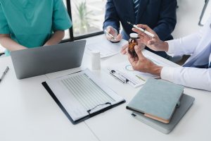 A group of cost consultants discussing a case
